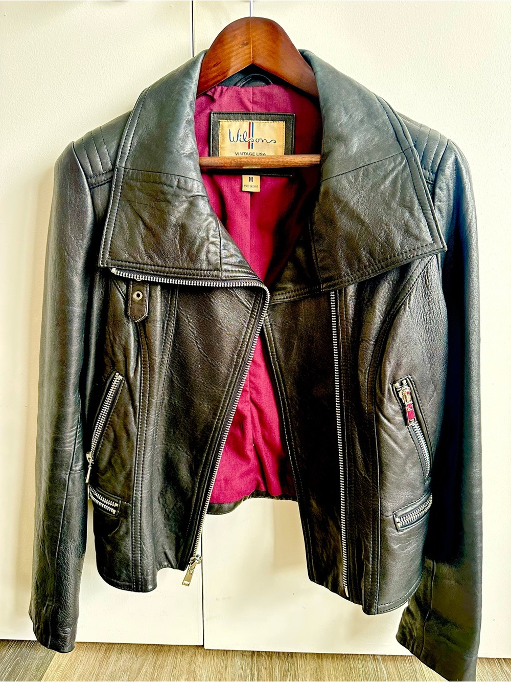 Wilsons Leather Black Leather Jacket with Burgundy Lining